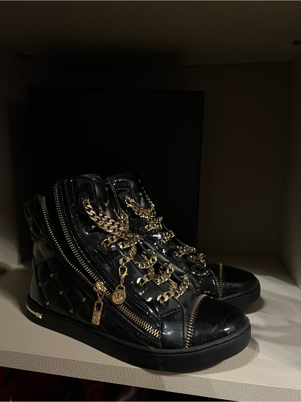 Michael Kors Black Quilted High-Top Sneakers with Gold Chain Detail